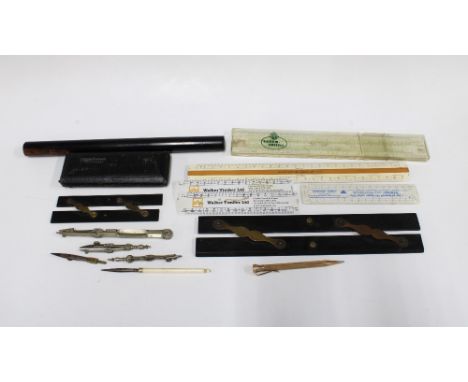 Collection of vintage drawing tools, including a 14k rolled gold propelling pencil, two parallel rules, rulers, compasses, a 
