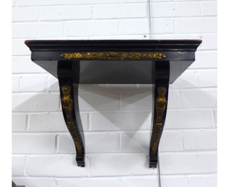An ebonised and parcel gilt wall bracket shelf, 44 x 35 x 34cm.