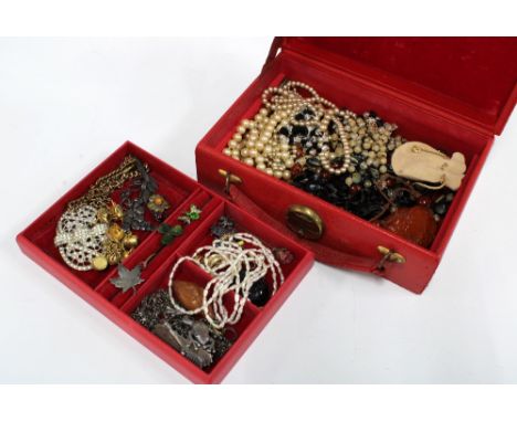 Red leather jewellery case with a collection of vintage costume jewellery, etc