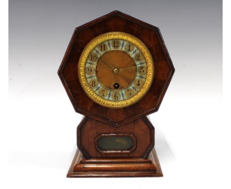 Early 20th century mantle clock with octagonal head, gilt metal border and painted face, 24cm