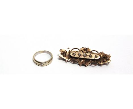 A 9CT GOLD AND HALF-PEARL BROOCH  and a small diamond solitaire ring, stamped '750'