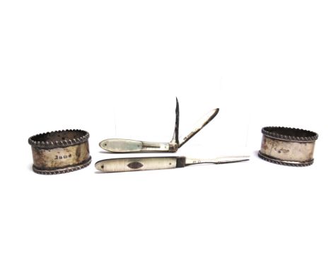 A GEORGE III SILVER AND MOTHER OF PEARL HANDLED FOLDING TWO-PRONG FRUIT FORK  a Victorian silver and mother of pearl combined