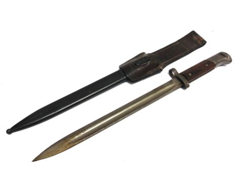 A CZECHOSLOVAKIAN VZ-24 KNIFE BAYONET  circa 1946, for use with the Mauser Kar 98k rifle, the 30cm blade unmarked at the rica