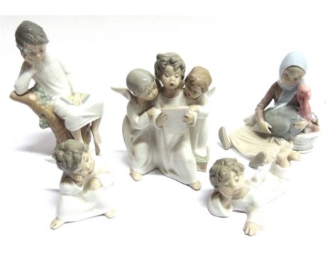FIVE VARIOUS LLADRO FIGURES:  4569G Girl with turkey, 4876 Boy on tree trunk, and three angel figures