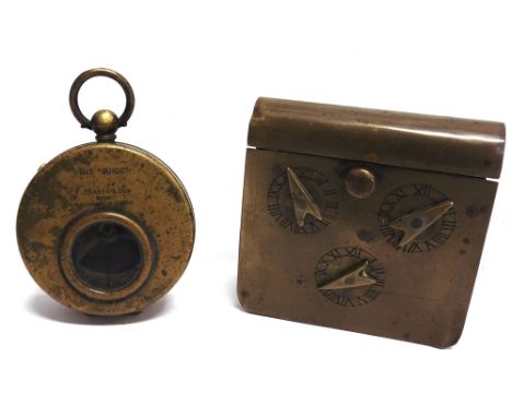 A BRASS POCKET COMPASS 'THE GUIDE'  by F. Barker &amp; Son, London; together with a brass box, of book form, the lid with com
