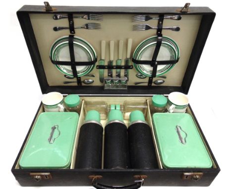 AUTOMOBILIA - A SIRRAM PICNIC SET  with settings for four people, cased. 