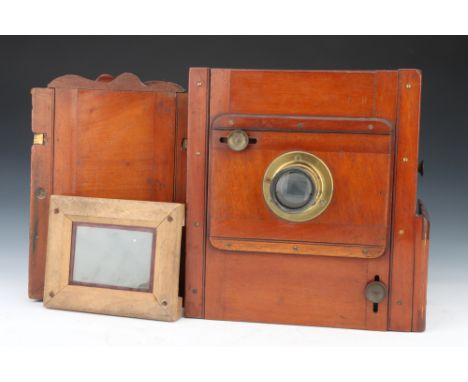 An Unmarked Half Plate Tailboard Camera, mahogany &amp; brass, body G, bellows may require attention, with unmarked f/8 brass