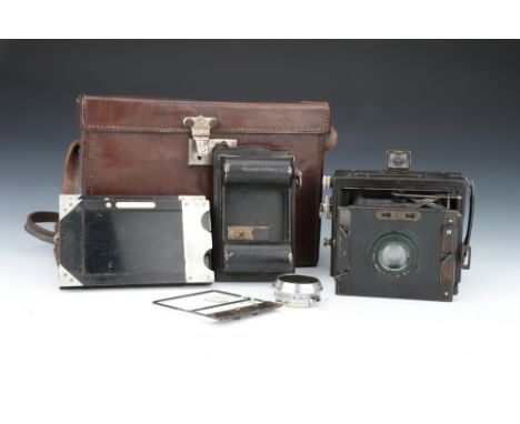 A Zeiss Ikon Deckrullo Nettel Folding Plate Camera, black, body F-G, shutter working, curtains may require attention, plates 