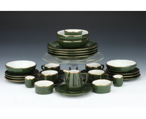 An Apilco French Porcelain Bistro Set, in green with gilt rim and including four ramekins, cups and saucers, side plates, mil