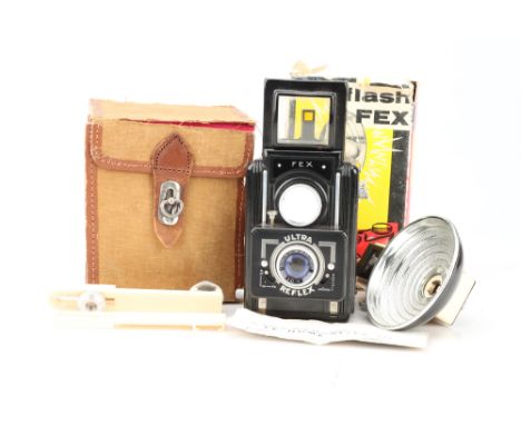 A Fex Ultra Reflex TLR Camera Outfit, black, body G, shutter not working, together with Fex flash unit, both untested in make