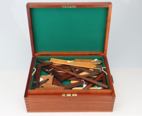 A Collection of Drawing Instruments, a large mahogany case with campagn handles, three trays with instruments in boxwood, mah