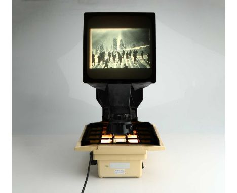 A Slidex Slide File Projector, complete with Slidex screen box, slide tray, and dust cover, without power cable (standard C13