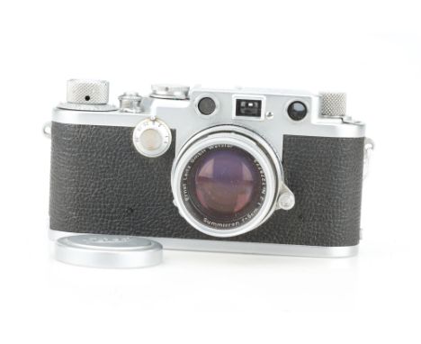 A Leica IIIf Rangefinder Camera, chrome, serial no. 648298, body G-VG, shutter sticking, with a Leitz Summicron 50mm f/2 lens