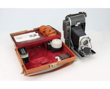 A Polaroid Pathfinder Model 120 Instant Camera Outfit, grey, body G, some light internal corrosion, bellows G-VG but edges fr