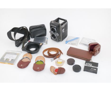 A Selection of Medium Format Camera Accessories, including Linhof lens boad, Hasselblad neck strap, Rolleiflex neck strap, Ro