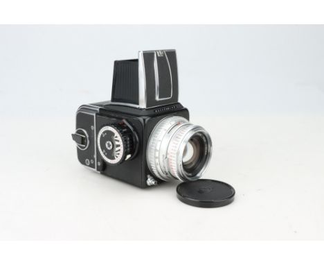 A Hasselblad 500cm Medium Format Camera, serial no. EU1229394, with Carl Zeiss Planar f/2.8 80mm lens, chrome, serial no. 459