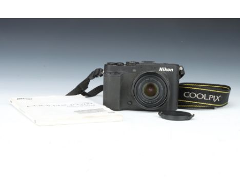 A Nikon Coolpix P7700 Digital Compact Camera, black, untested, missing battery and charger, body G, with instruction manual a