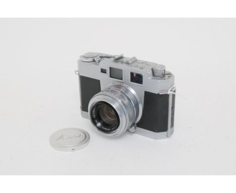 An Aires 35-IIIL Rangefinder Camera, with Aires H Coral f/1.9 45mm lens, body, F, shutter working, rangefinder patch faint, l