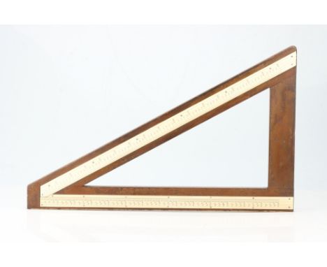 An Unusual Measuring and Pricing Square, a large heavy mahogany instrument, c.1900, one edge brass-bound, with inlaid ivorine