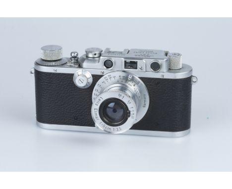 A Leica II 35mm Rangefinder Camera, chrome, upgraded to a Leica III, serial no. 249259, body VG, shutter working, with Wallac