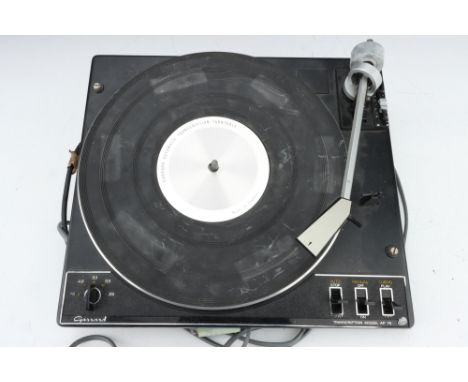 A Garrard Transcription Model AP 76 Turn Table Record Player, black, deck only with no housing, missing cartridge, untested,