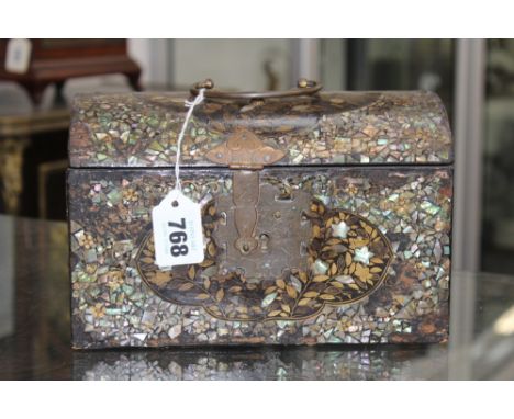 AN ANTIQUE JAPANESE DOME TOP LACQUER COFFER WITH GILT FOLIATE DECORATION AND MOTHER OF PEARL SURROUNDS