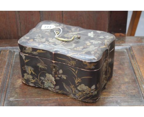 AN ANTIQUE ORIENTAL EXPORT LACQUER TEA CADDY WITH OVER ALL FOLIATE AND BIRD DECORATION.