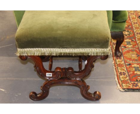 AN EARLY VICTORIAN CARVED ROSEWOOD X FRAMED STOOL