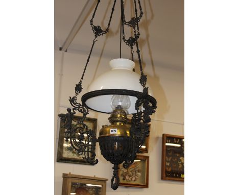 A VICTORIAN HANGING OIL LAMP