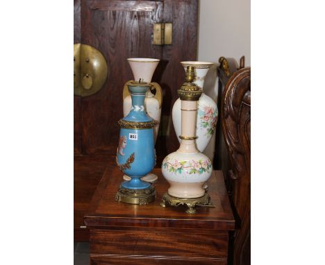 TWO ANTIQUE OPAQUE GLASS VASES AND TWO ORMOLU MOUNTED LAMP BASES