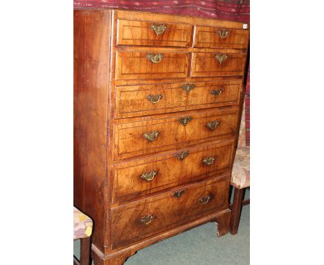 A WALNUT 18TH.C.TALL CADDY TOP CHEST OF FOUR SHORT AND FOUR LONG DRAWERS