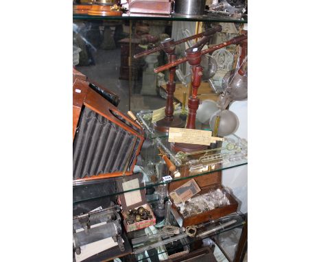 A RARE EARLY GROUP OF X-RAY APPARATUS TOGETHER WITH A COLLECTION OF EARLY LIGHT BULBS, GIESSLER TUBES ETC.