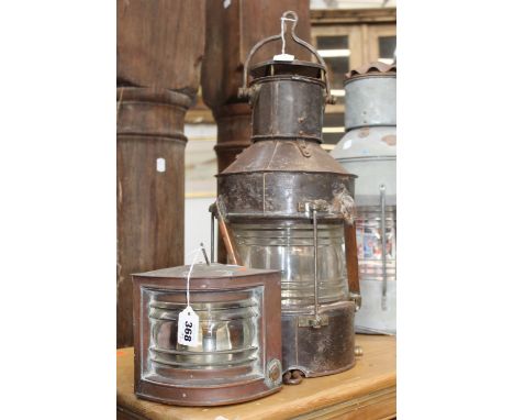 TWO VINTAGE SHIP LIGHTS. ONE OF TALL CYLINDER FORM AND ANOTHER SMALL COPPER SIDE LIGHT