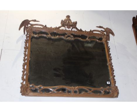 A CARVED PINE CHIPPENDALE STYLE WALL MIRROR