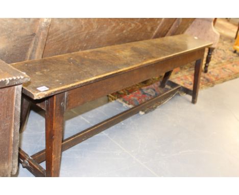 A GEORGIAN OAK HALL BENCH