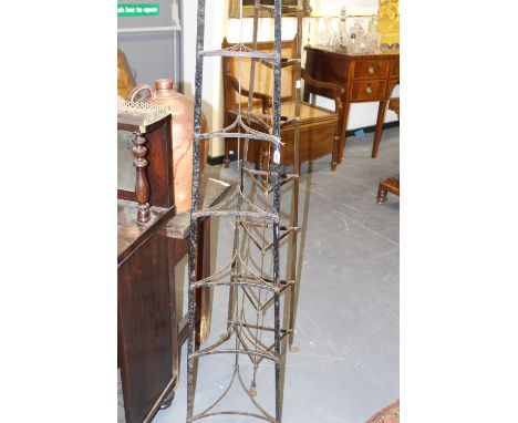 TWO VINTAGE WROUGHT IRON FLOORSTANDING POT STANDS.