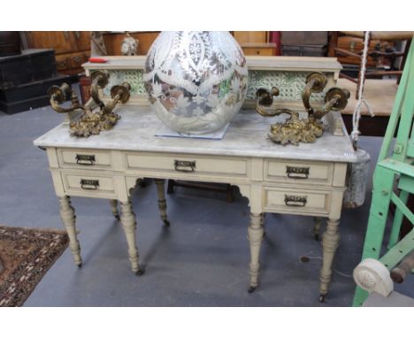 A LATE VICTORIAN MARBLE TOPPED TILE BACK WASHSTAND