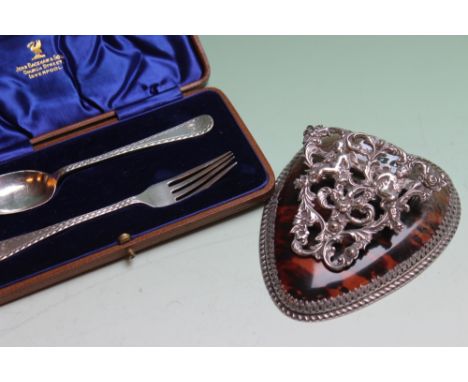 A VICTORIAN HEART SHAPED SILVER AND TORTOISESHELL LETTER DESK CLIP, LONDON 1894, 13 X 10CM, A SILVER CHRISTENING FORK AND SPO