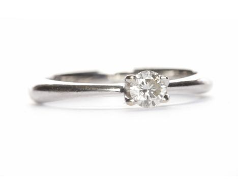 DIAMOND SOLITAIRE RINGthe round brilliant cut diamond of approximately 0.19 carats in fourteen carat white gold, size K, 2.3g