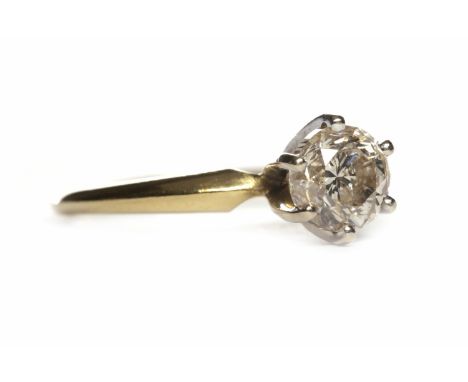 DIAMOND SOLITAIRE RINGthe six claw set round brilliant cut diamond of approximately 0.72 carats, on an unmarked knife edge sh