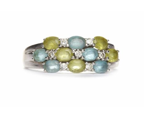FOURTEEN CARAT WHITE GOLD GEM SET RINGset with white, green and blue gems, size R, 4.8g