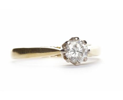 EIGHTEEN CARAT GOLD DIAMOND SOLITAIRE RINGthe round brilliant cut stone of approximately 0.31 carats, size K, 2.3g