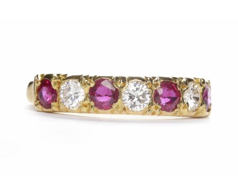 EIGHTEEN CARAT GOLD RUBY AND GEM SET RINGsize W, 4.3g