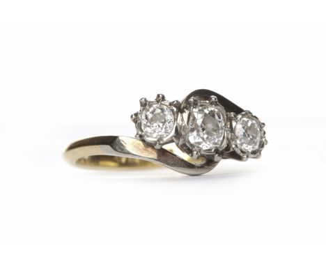 DIAMOND THREE STONE RINGthe central old cushion cut diamond measuring approximately 3.68x3mm flanked by two further cushion c