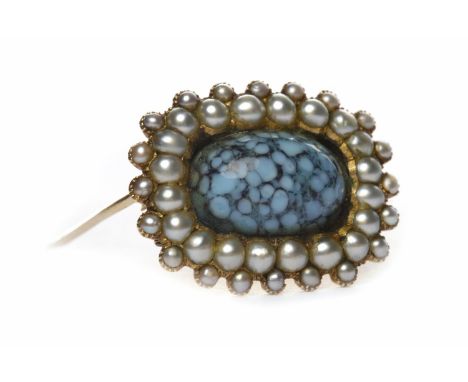 GEORGE IV BROOCHthe central oval ceramic cabochon surrounded by split pearls, the unmarked back with inscription dated 1832, 