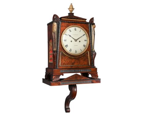 A REGENCY BRASS MOUNTED MAHOGANY BRACKET CLOCK IN THE MANNER OF THOMAS HOPE WITH WALL BRACKETLEPLASTRIER, THE CASE POSSIBLY B