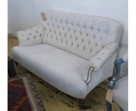 SOFA, buttoned back, in cream linen, 153cm W x 84cm H.