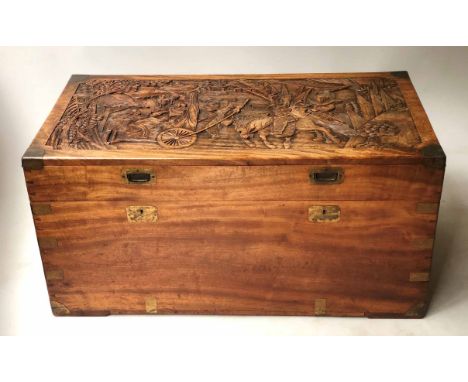 HONG KONG TRUNK, early 20th century, camphorwood and brass bound, with carved lid and carrying handles, internally stamped 'C