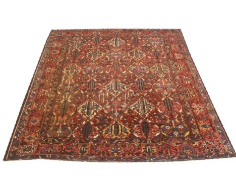 ANTIQUE PERSIAN BAKTIAR GARDEN DESIGN CARPET, 401cm x 329cm.