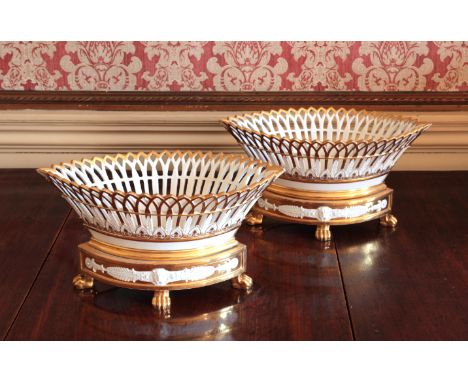 A PAIR OF NEOCLASSICAL DARTE FRÈRES PARIS PORCELAIN FRUIT BASKETSbearing red printed marks to the bases, of elliptical form w